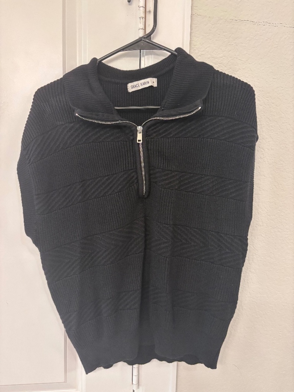 Black short sleeve sweater